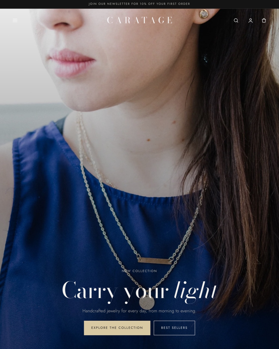 Caratage home page with a full-width hero image of a layered gold necklace